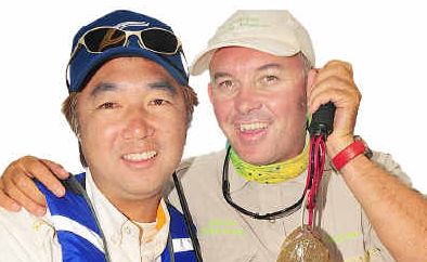 Well known Japanese angler Mitsuya Hotta and keen Hervey Bay fisherman Andy Beer off Fraser Island reel in a flat head for a television film crew. Well known Japanese angler Mitsuya Hotta and keen Hervey Bay fisherman Andy Beer off Fraser Island reel in a flat head for a television film crew.